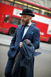 Bowler hat on suit